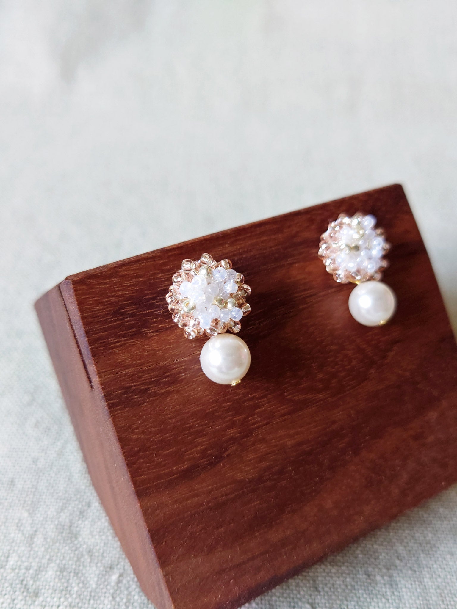 Faye Rio Drop Earrings in Champagne Pink Display