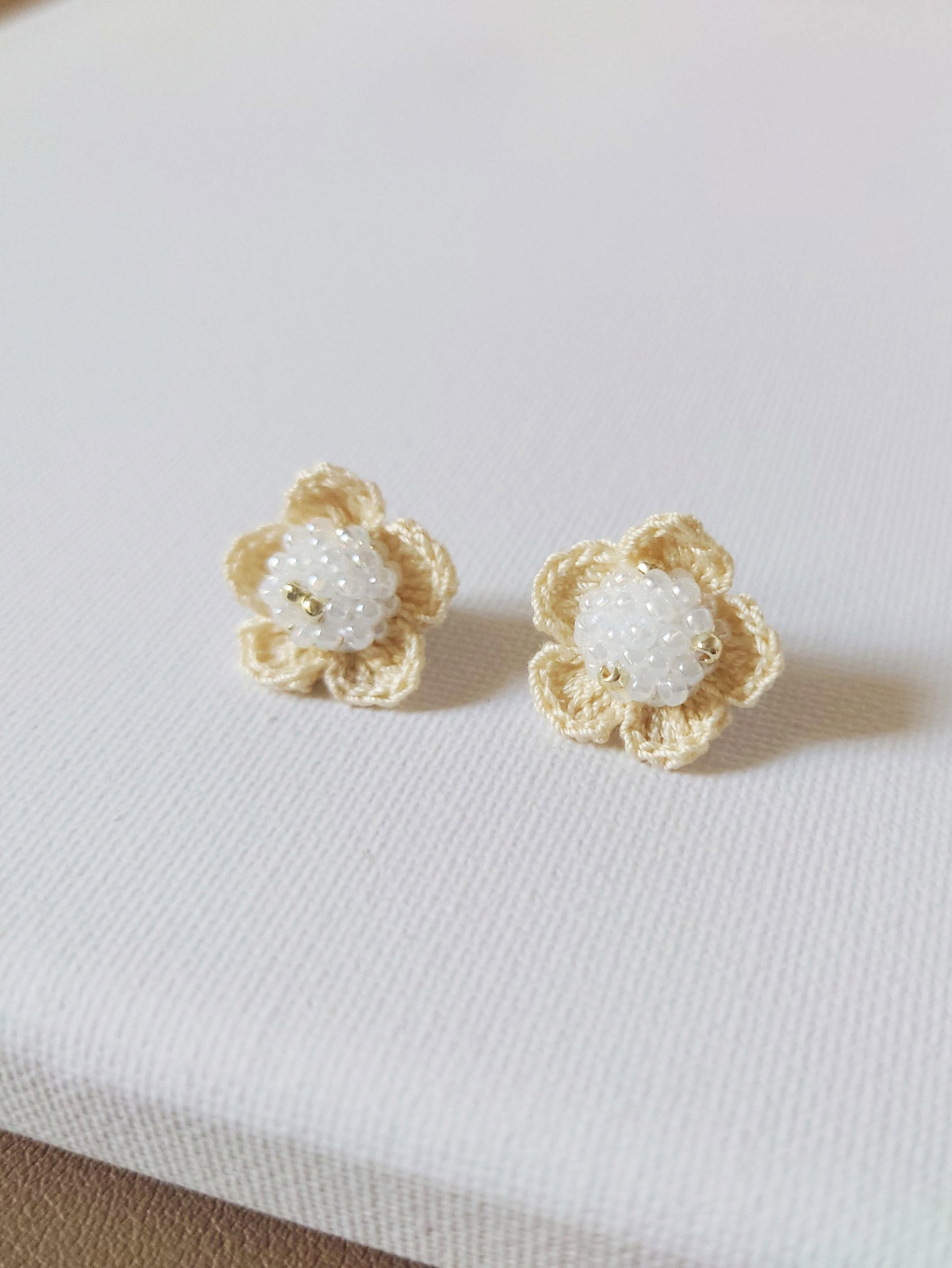Floral Stud Earrings in White Front