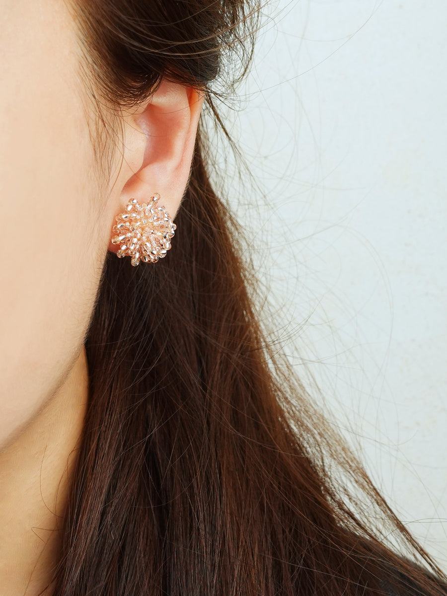 Fluffy Earrings in Champagne Pink Model
