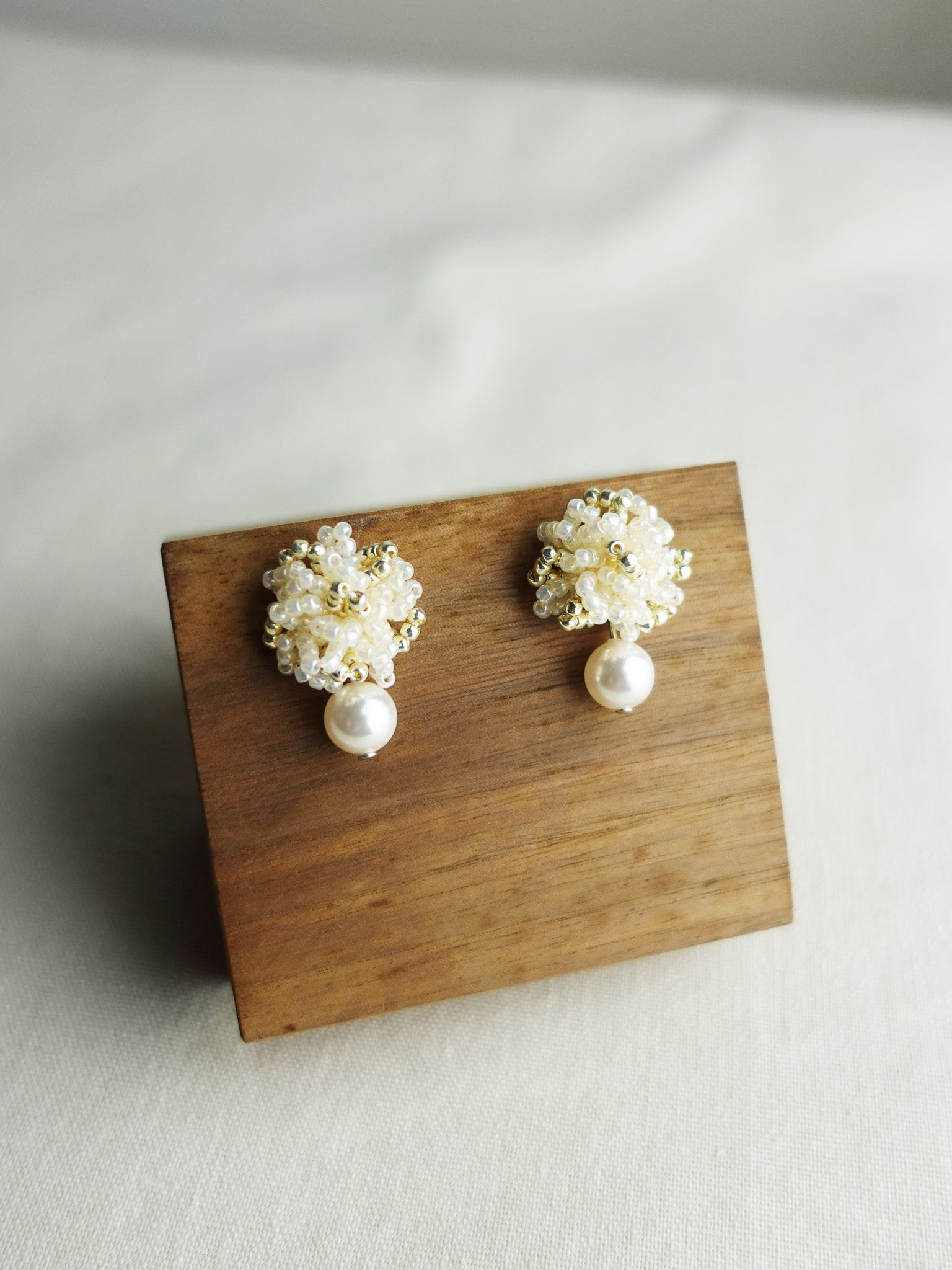 Fluffy Mariota Earrings in Ivory Display