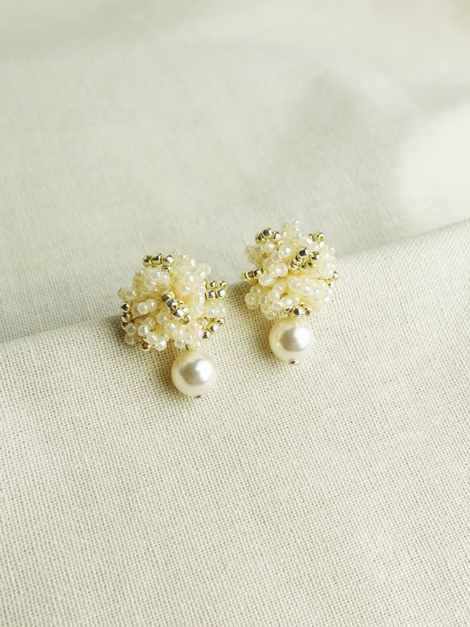 Fluffy Mariota Earrings in Ivory Front