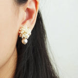 Fluffy Mariota Earrings in Ivory Model