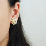 Fluffy Star Dust Earrings in Ivory Model