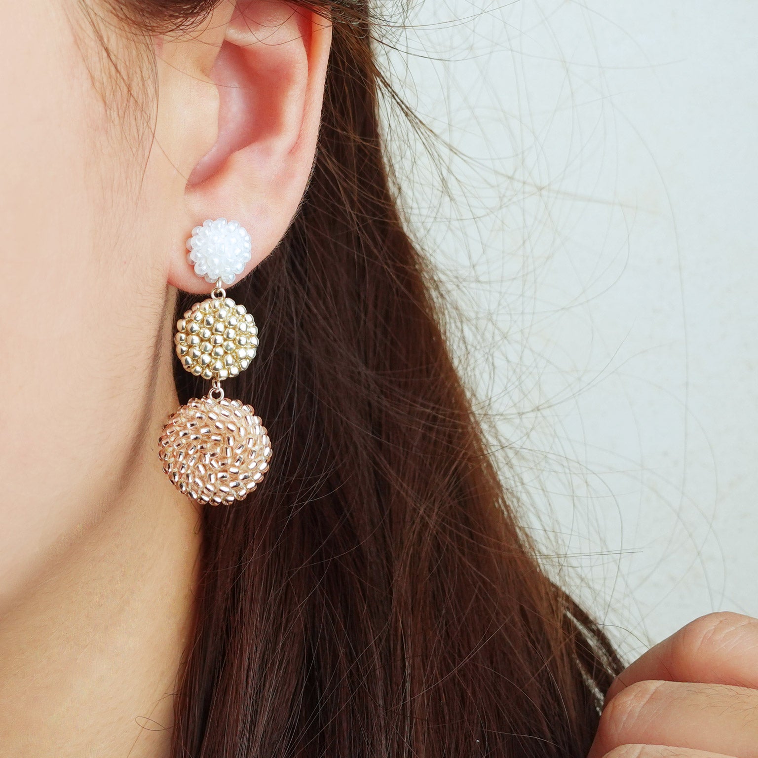 Juno Colorblock Earrings in Champagne Pink Model