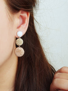 Juno Colorblock Earrings in Champagne Pink Model