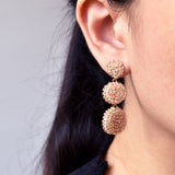 Juno Dangle Earrings in Champagne Pink Model