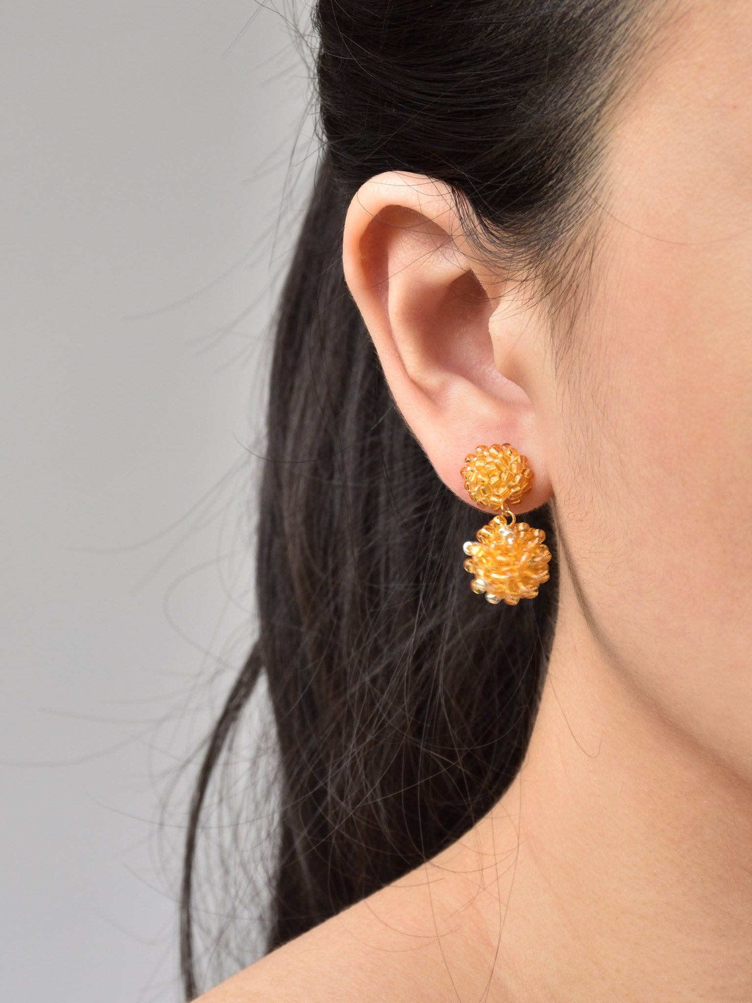 Kaia Druse Earrings in Topaz Model