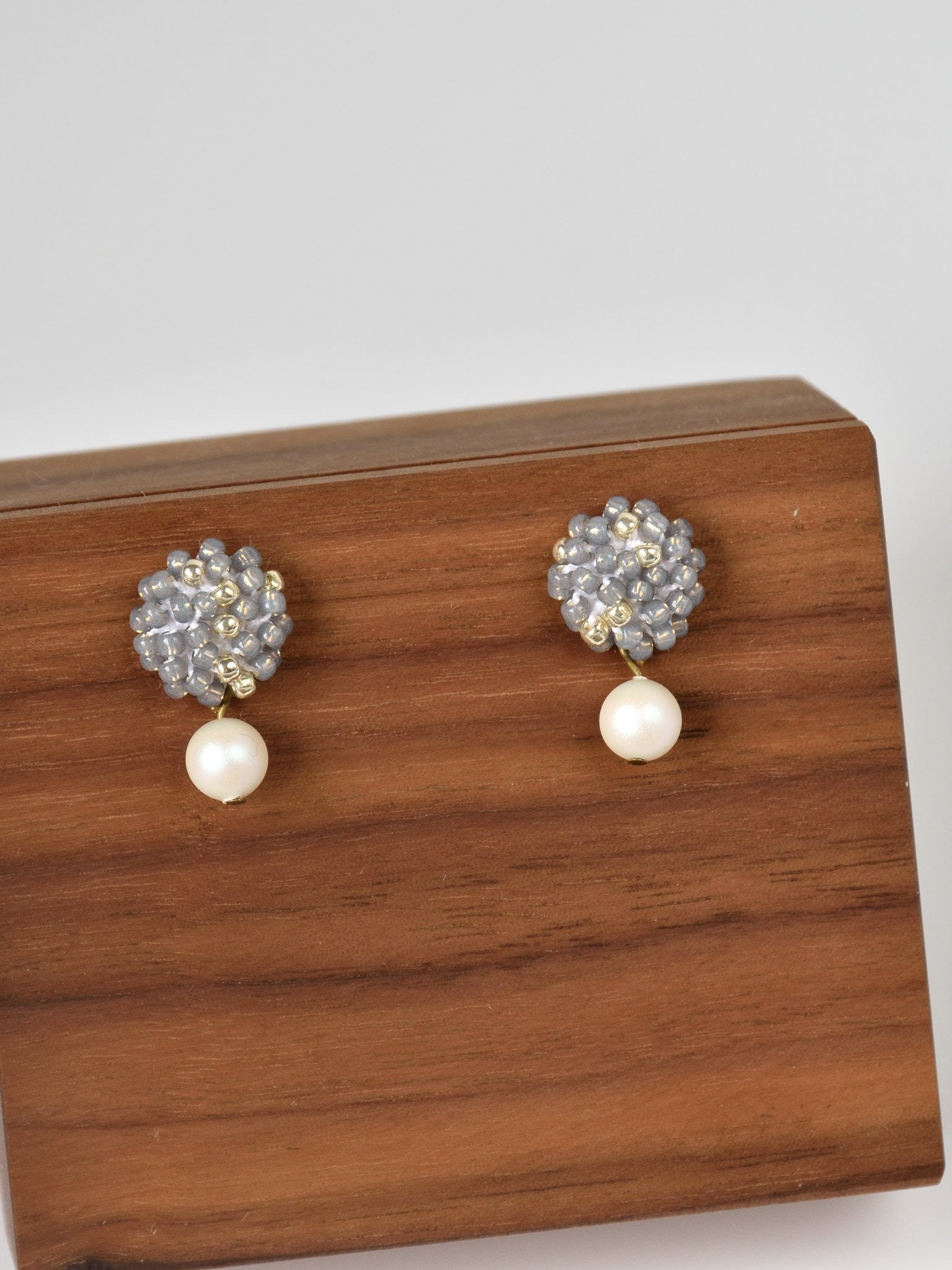 Layna Pearlescent Swarovski Pearl Studs in Grey Front