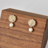 Layna Pearlescent Swarovski Pearl Studs in Ivory Front