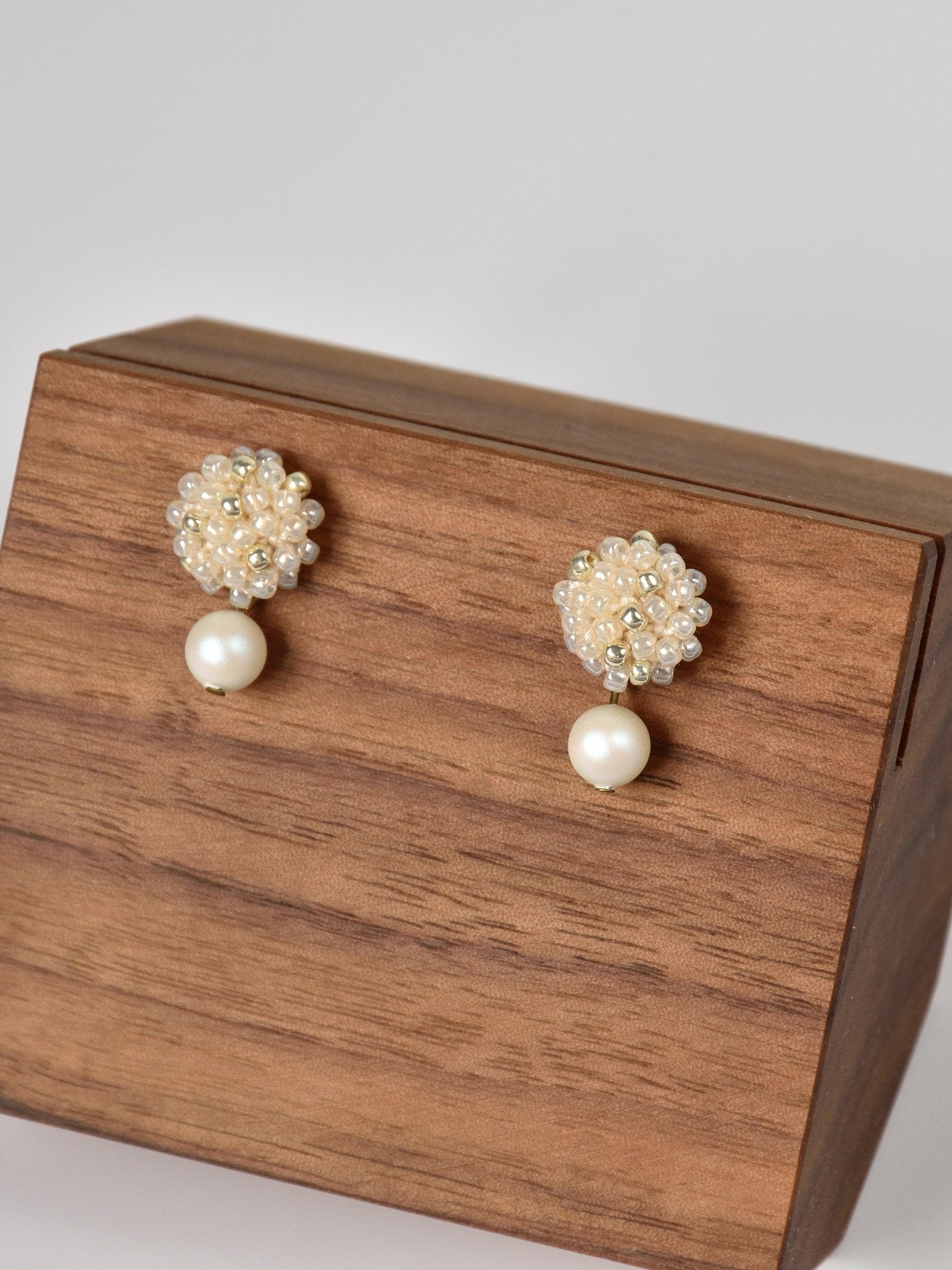 Layna Pearlescent Swarovski Pearl Studs in Ivory Front