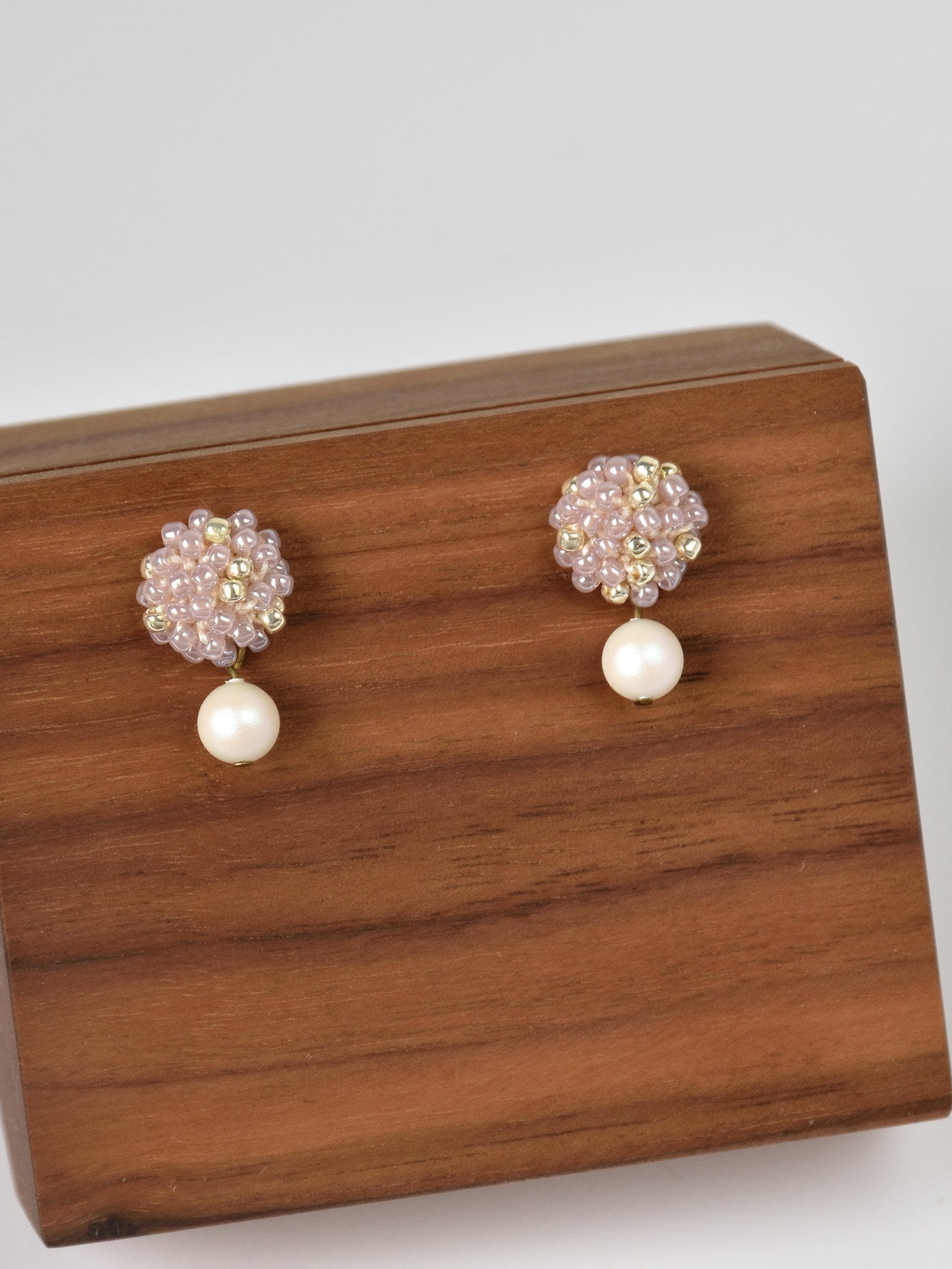 Layna Pearlescent Swarovski Pearl Studs in Purple Front