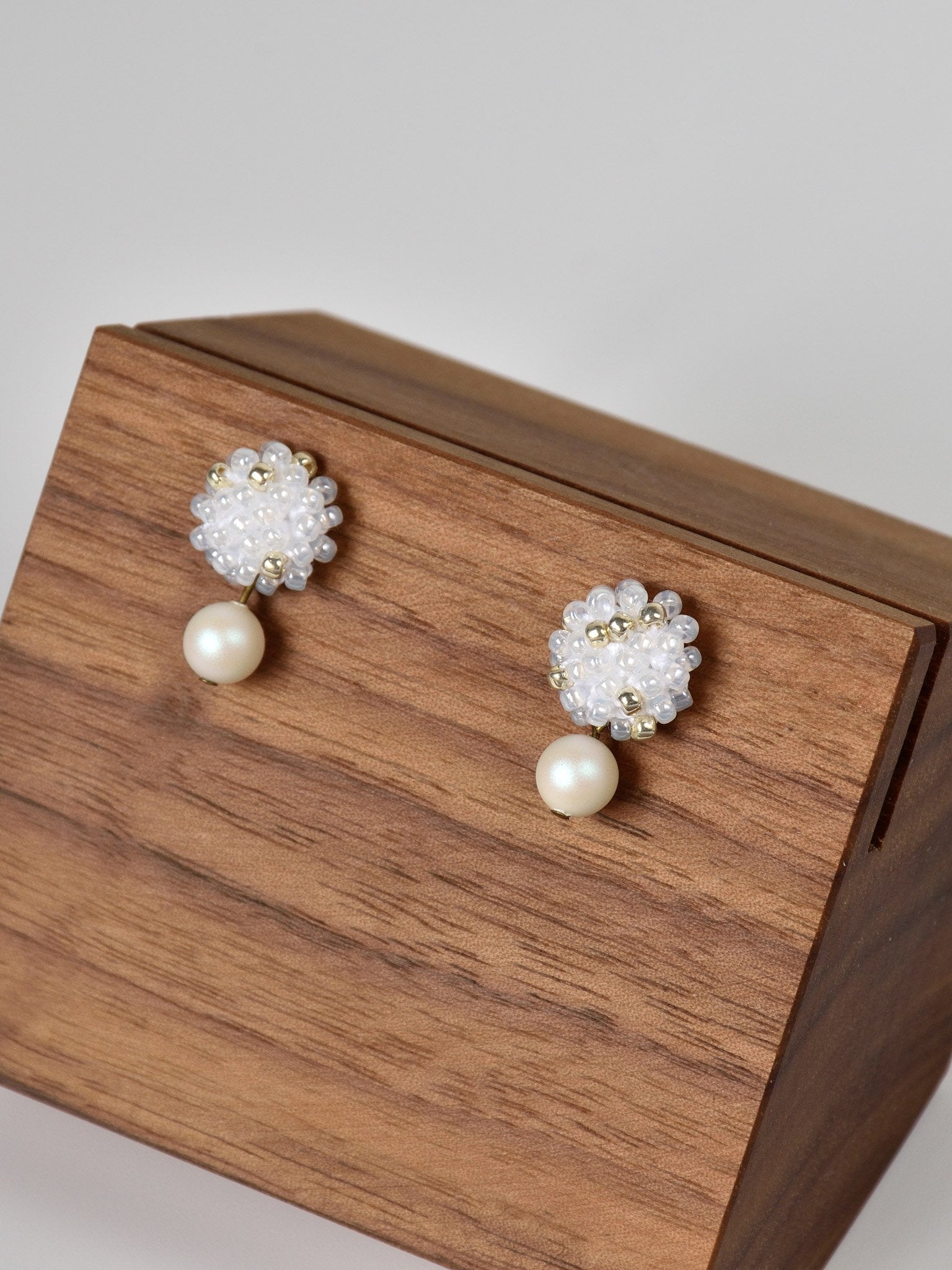 Layna Pearlescent Swarovski Pearl Studs in White Left
