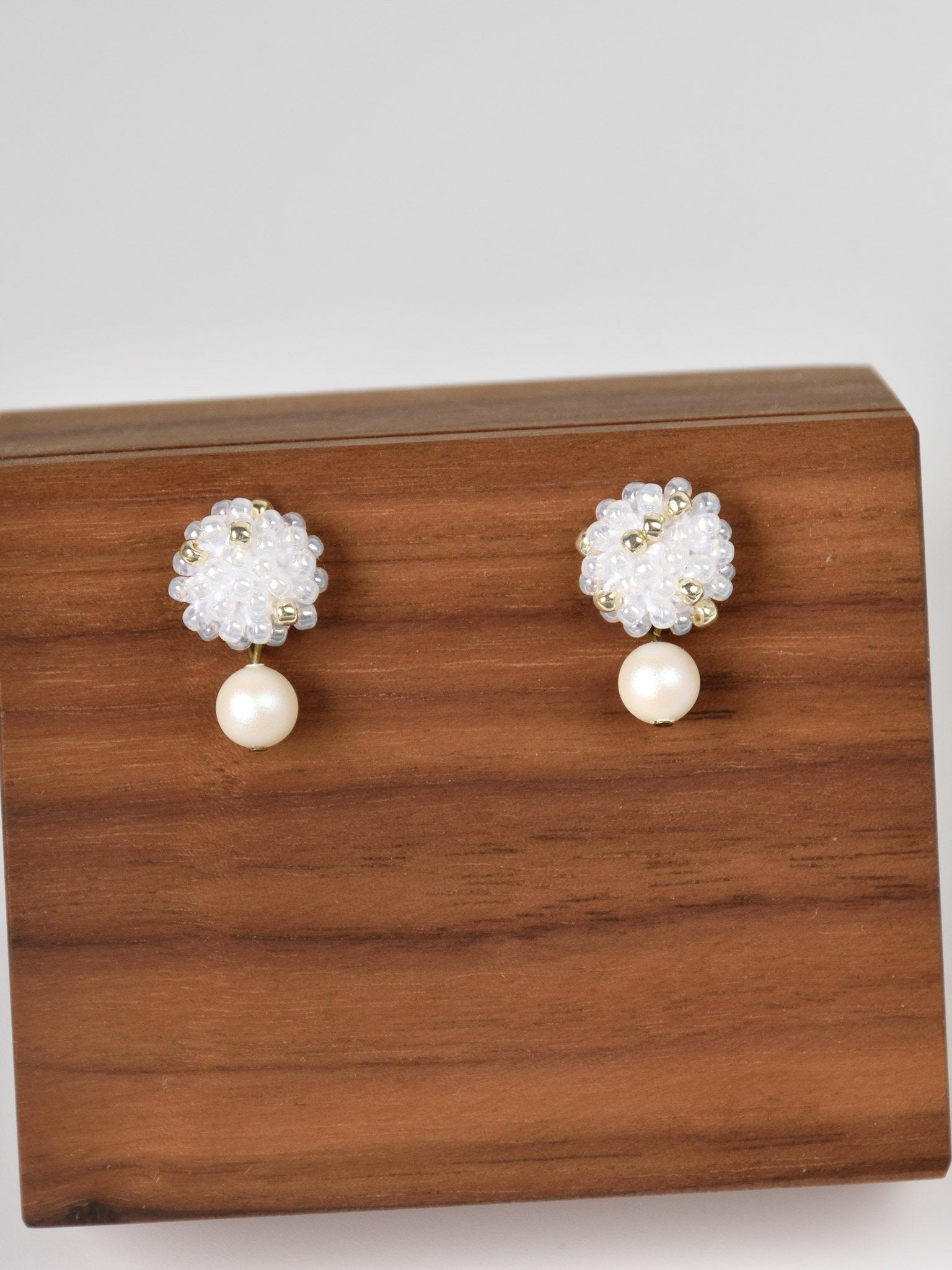 Layna Pearlescent Swarovski Pearl Studs in White Front