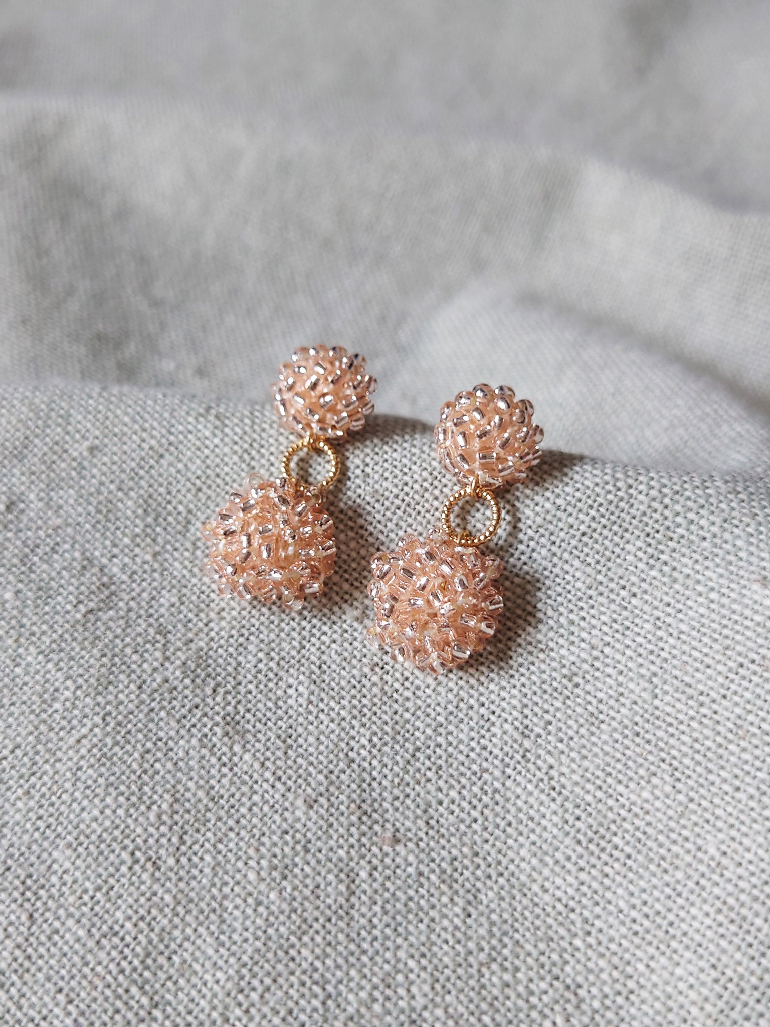 Larissa Drop Earrings in Champagne Pink Front 1