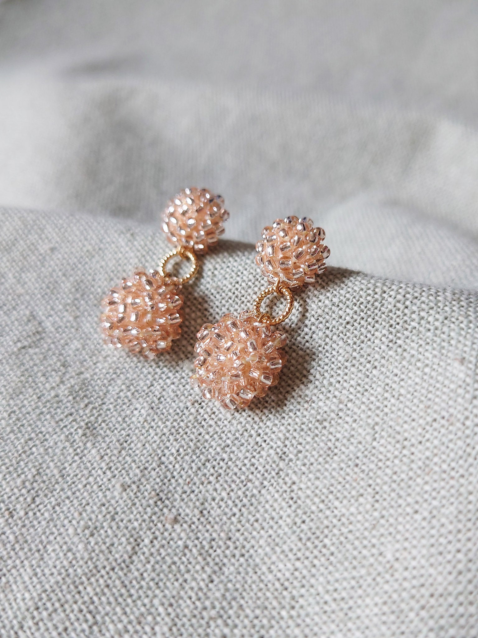 Larissa Drop Earrings in Champagne Pink Front 2