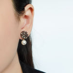Mariota Drop Earrings in Umber Model