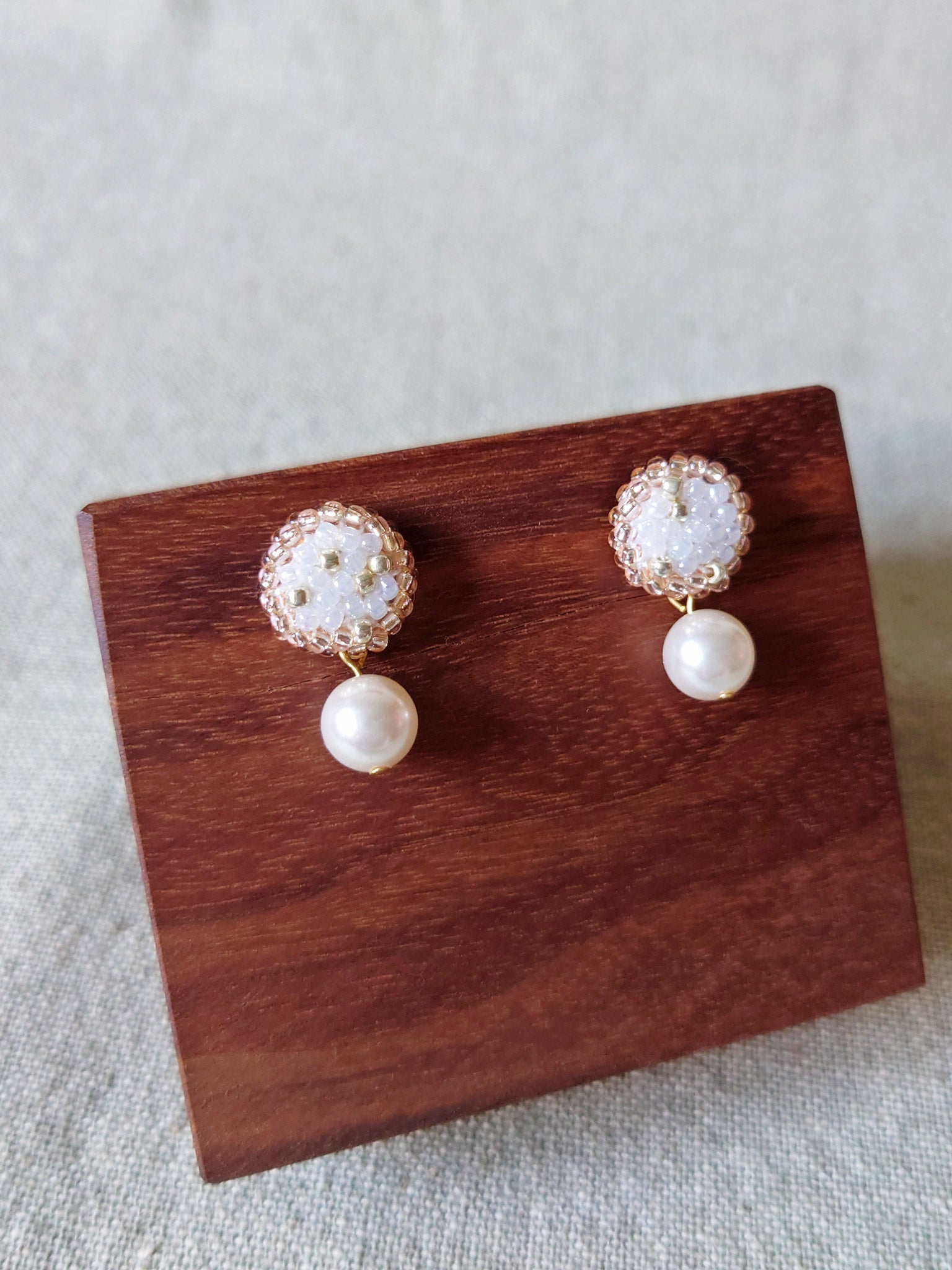 Mariota Rio Earrings in Champagne Pink Display