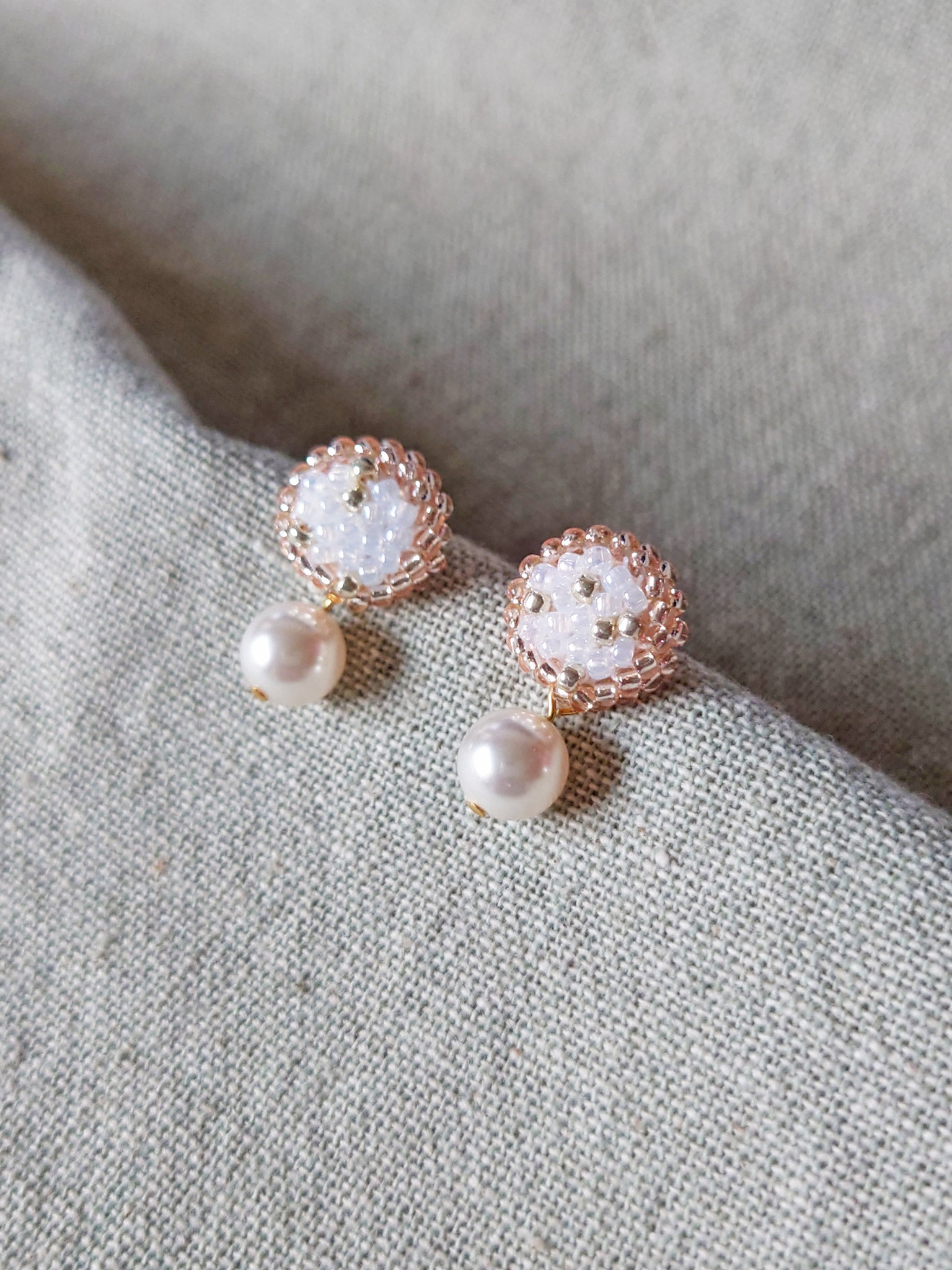 Mariota Rio Earrings in Champagne Pink Front
