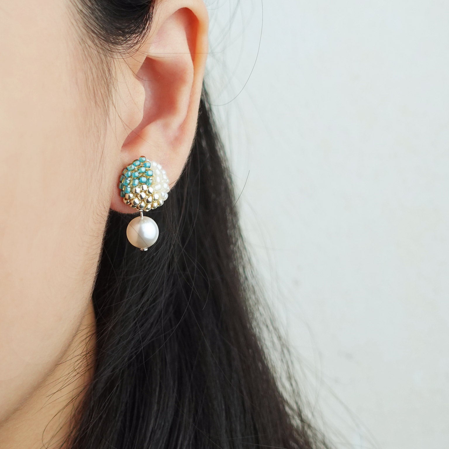 Mariota Trio Earrings in Ocean Green Model