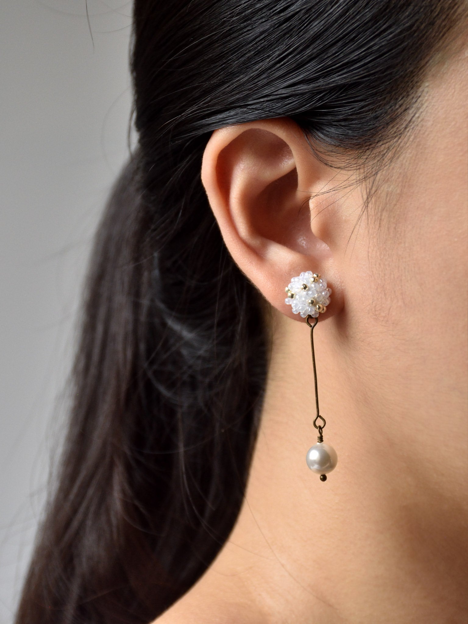 Meghan Pearl Pendulum Earrings Model