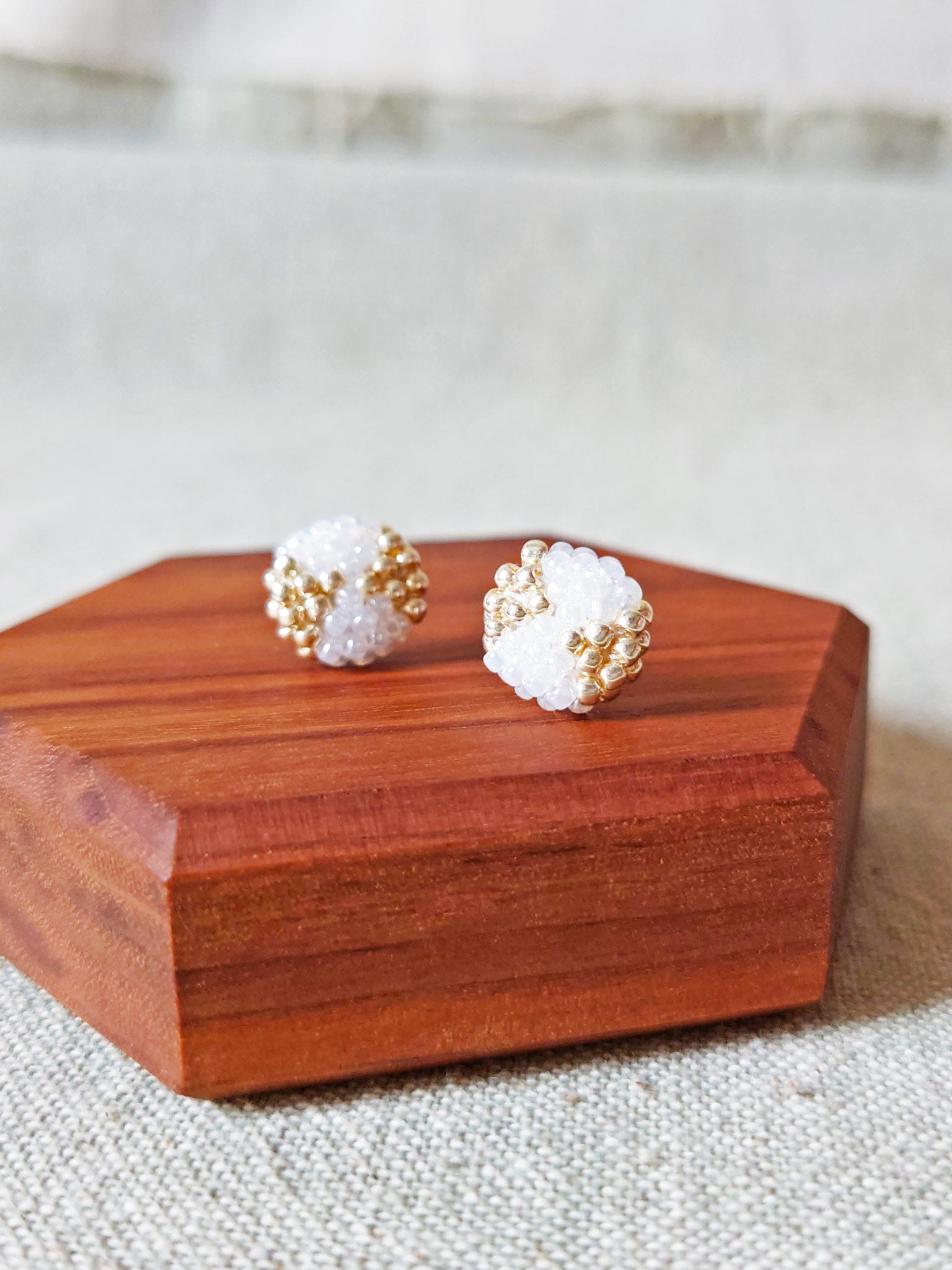 Octavia Stud Earrings in White Display Front 2