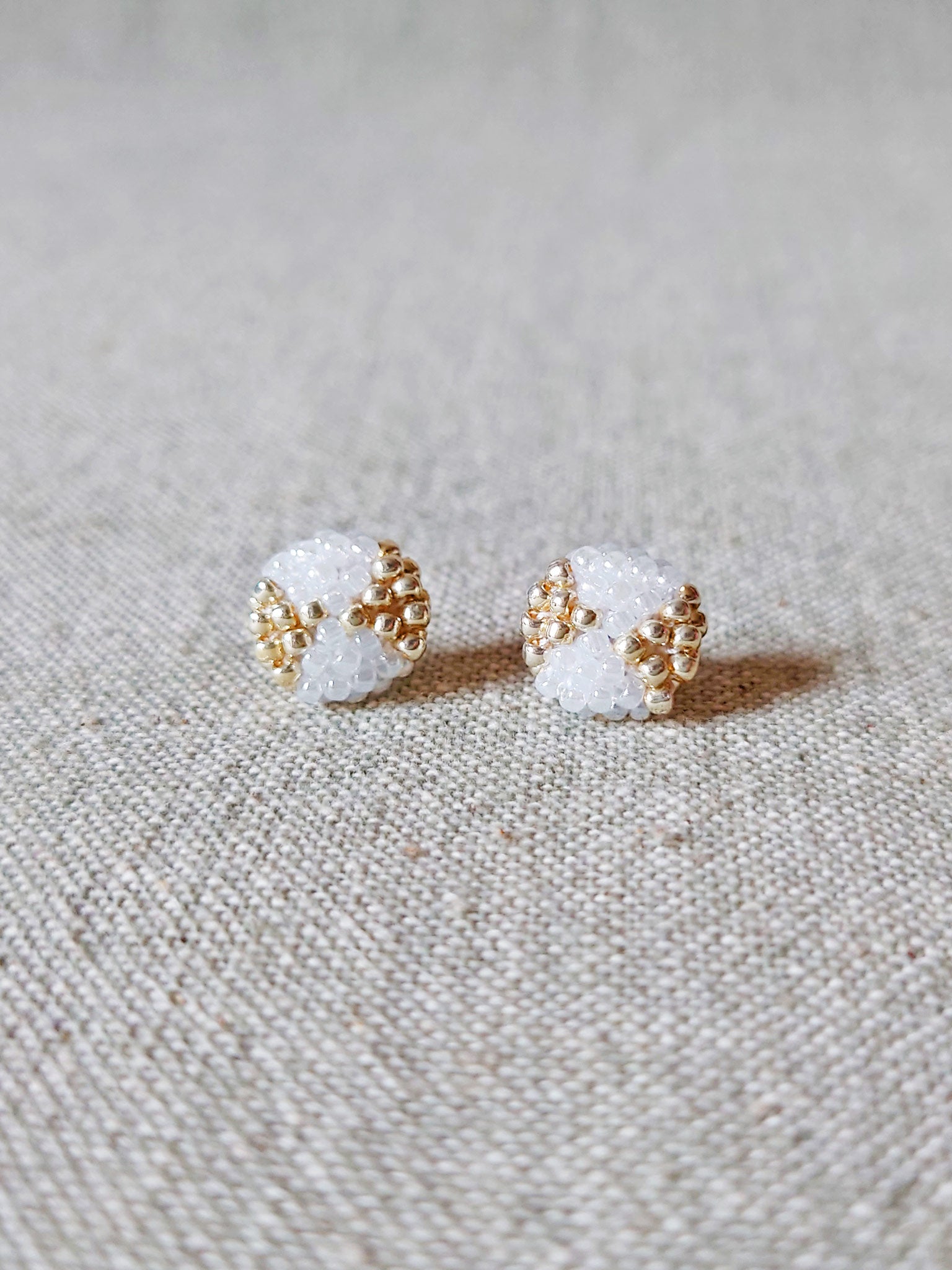 Octavia Stud Earrings in White Front