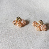 Orion X Earrings in Peach Left