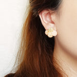 Orion X Earrings in Peach Model