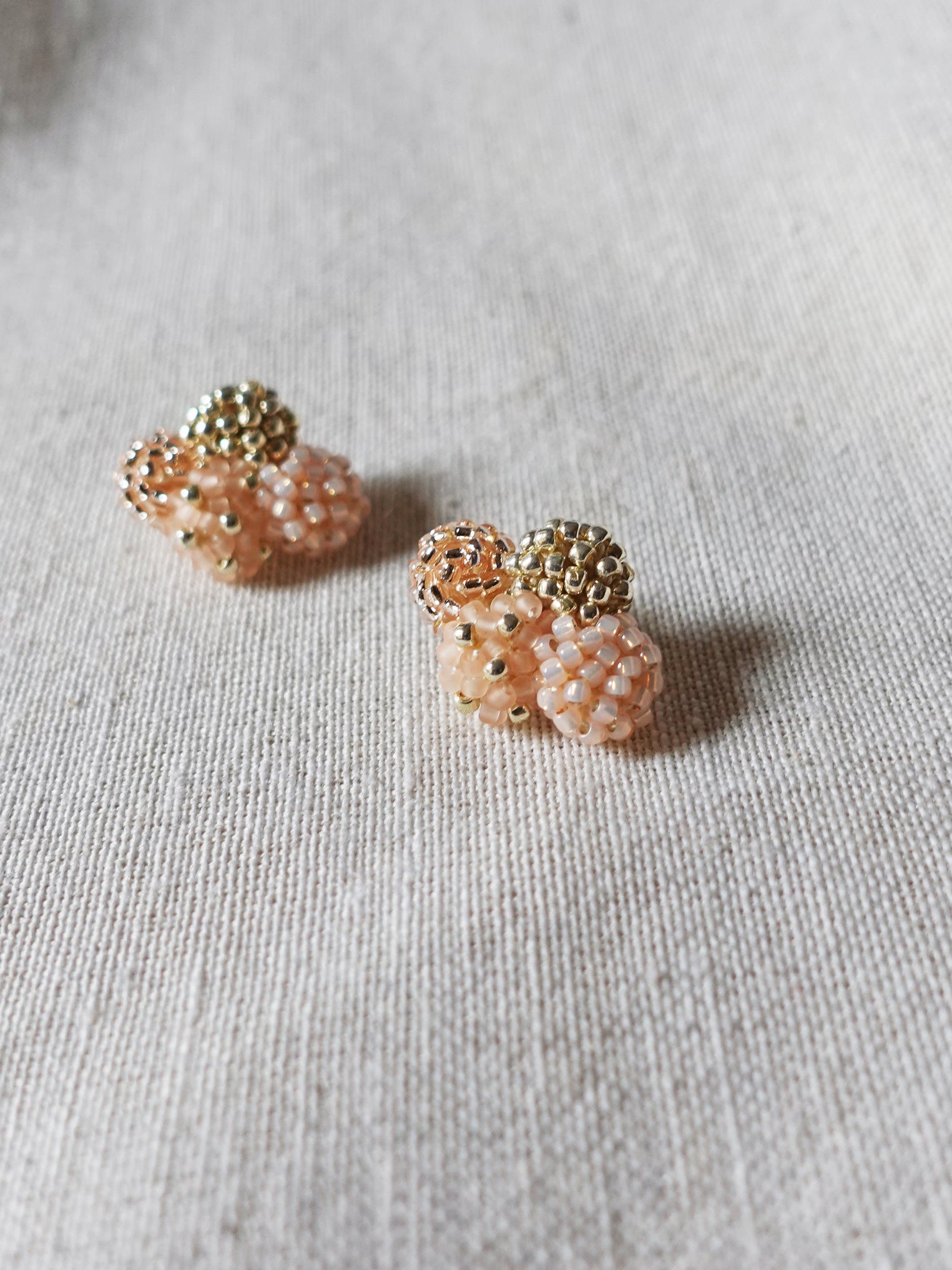 Orion X Earrings in Peach Right