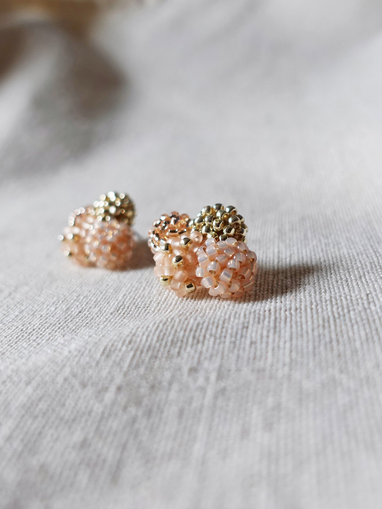 Orion X Earrings in Peach Side