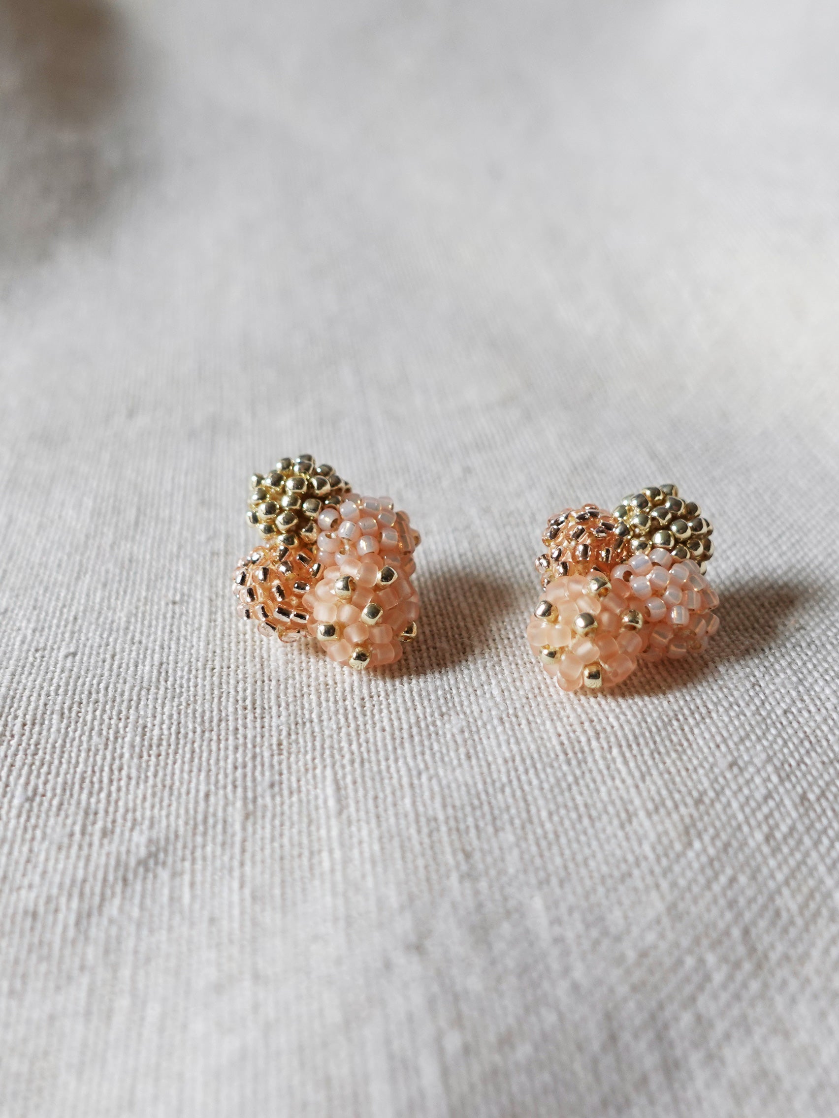 Orion Y Earrings in Peach Left