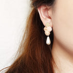 Orion Y Teardrop Earrings in Peach Model