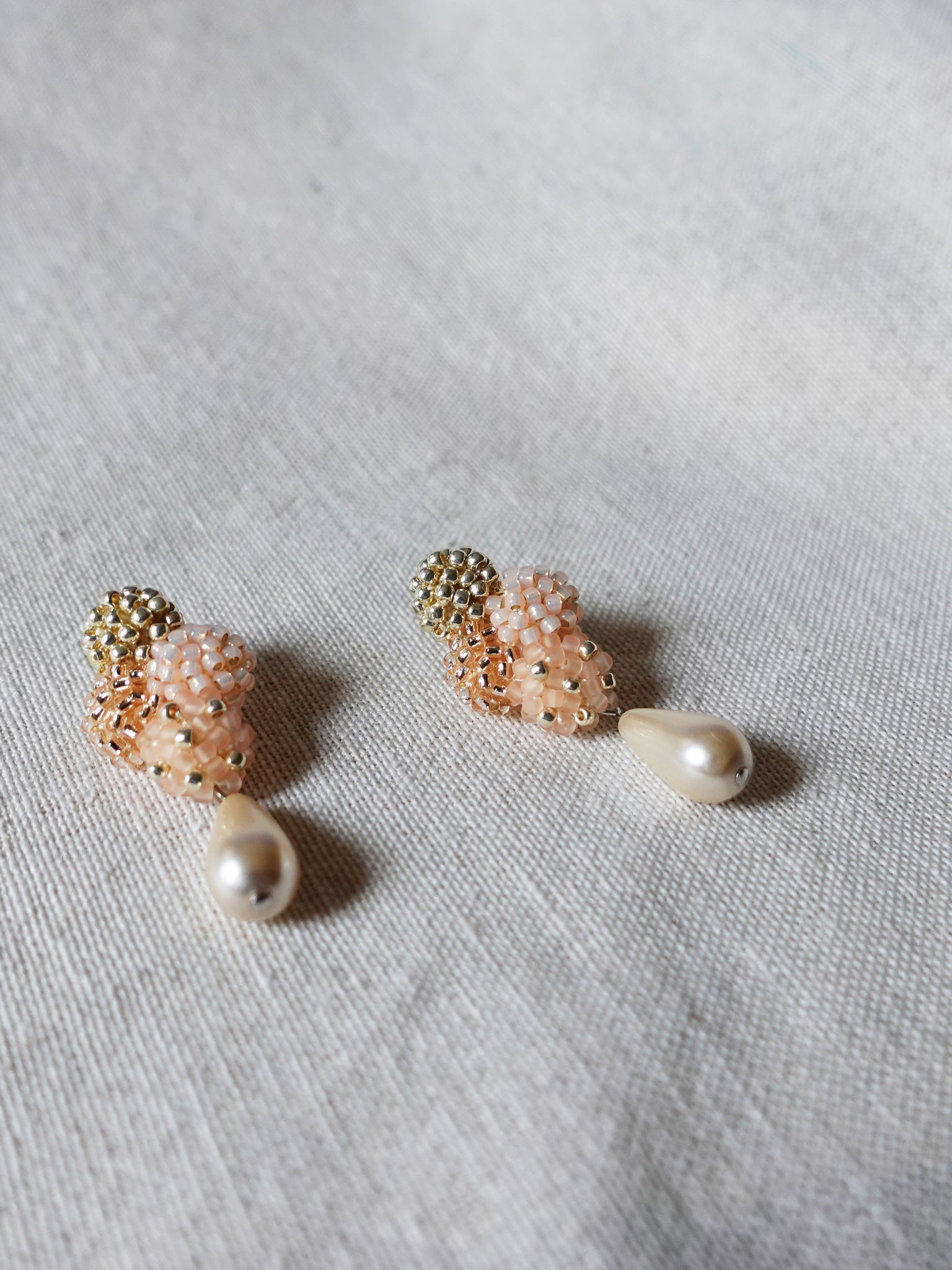 Orion Y Teardrop Earrings in Peach Side