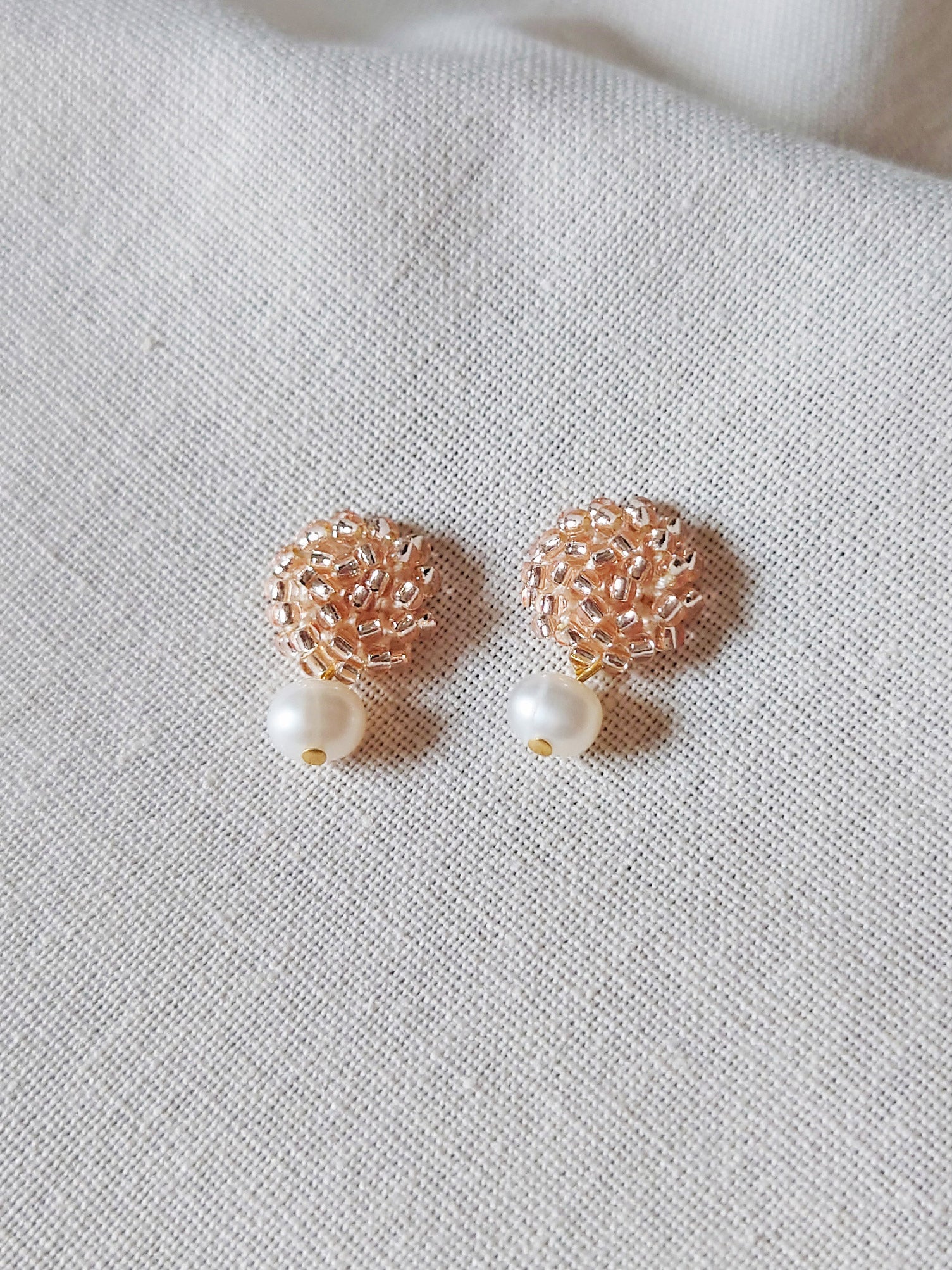 Phoebe Earrings in Champagne Pink Front