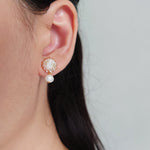 Phoebe Rio Earrings in Champagne Pink Model