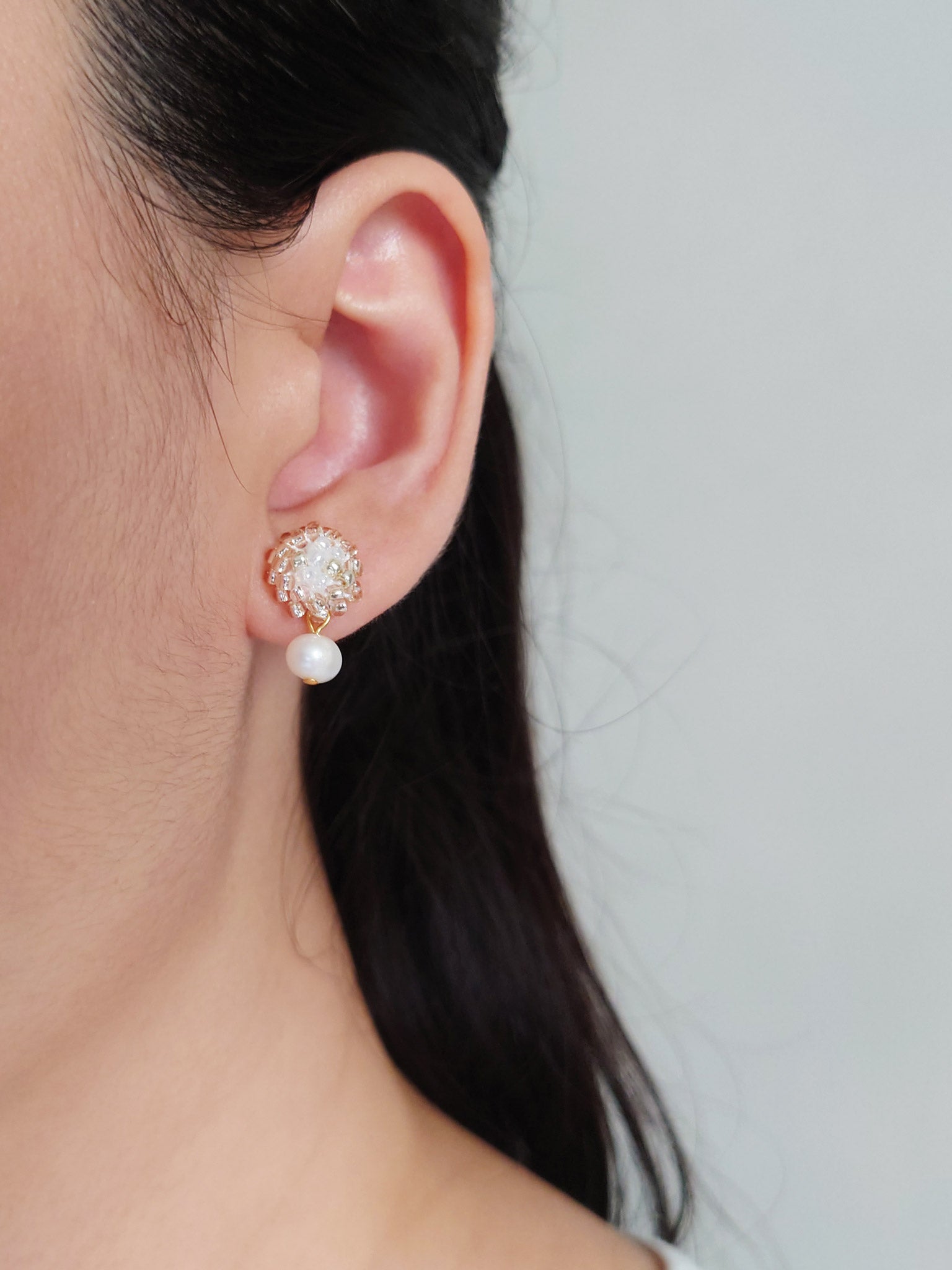 Phoebe Rio Earrings in Champagne Pink Model