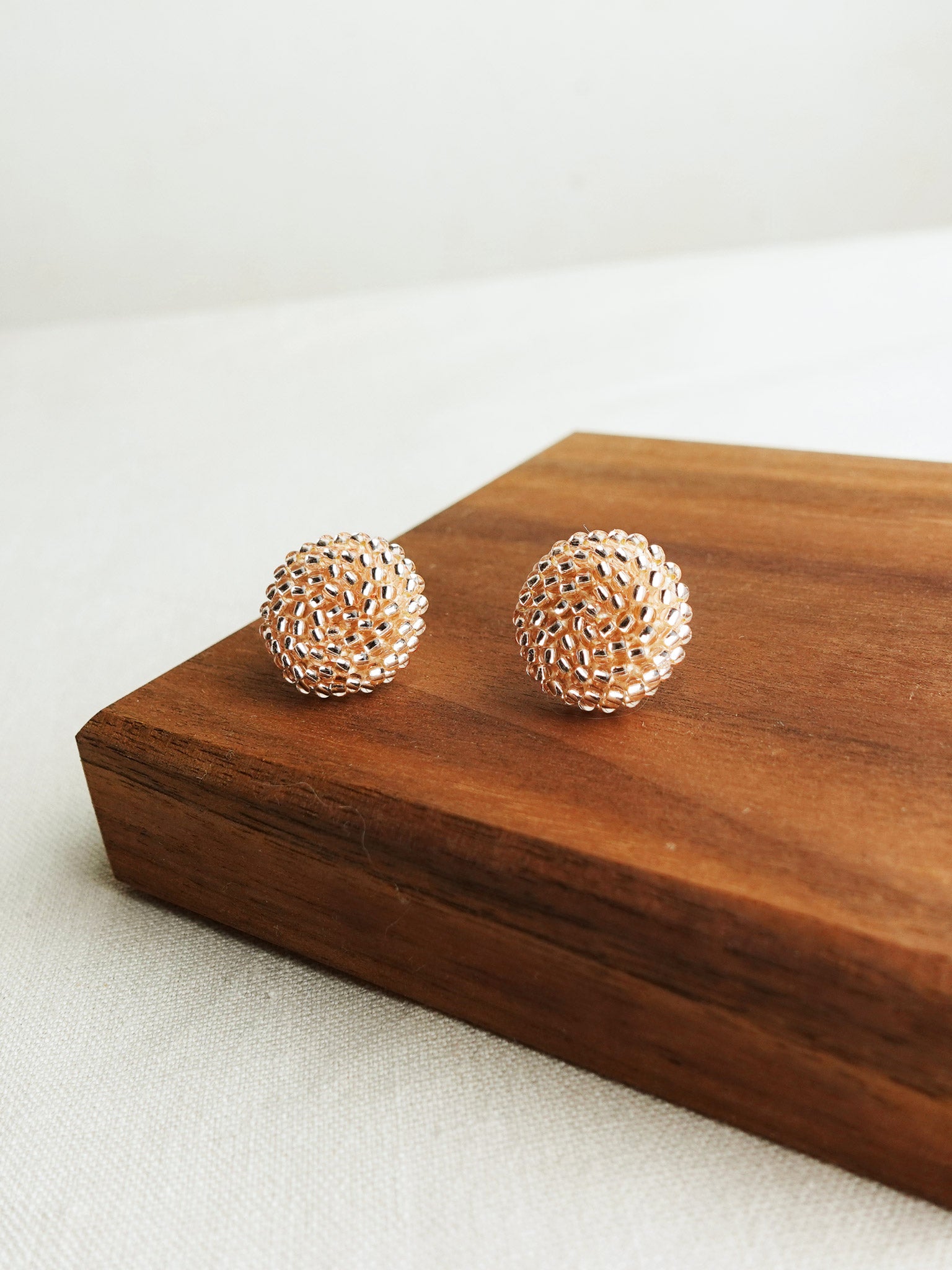 Prelude Maxi Stud Earrings in Champagne Pink Front