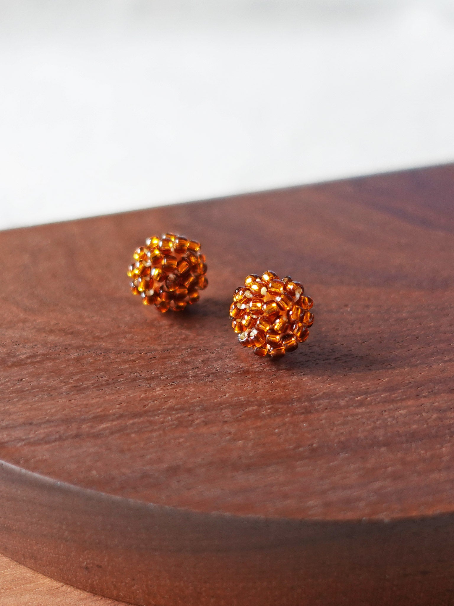 Prelude Petite Stud Earrings in Dark Amber Display SIngle