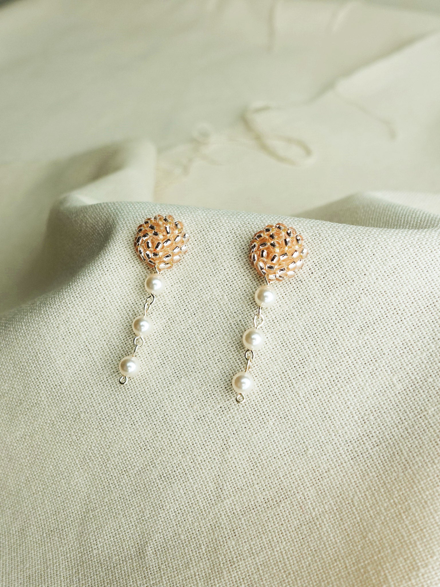 Raindrops on the Window Earrings in Champagne Pink Front