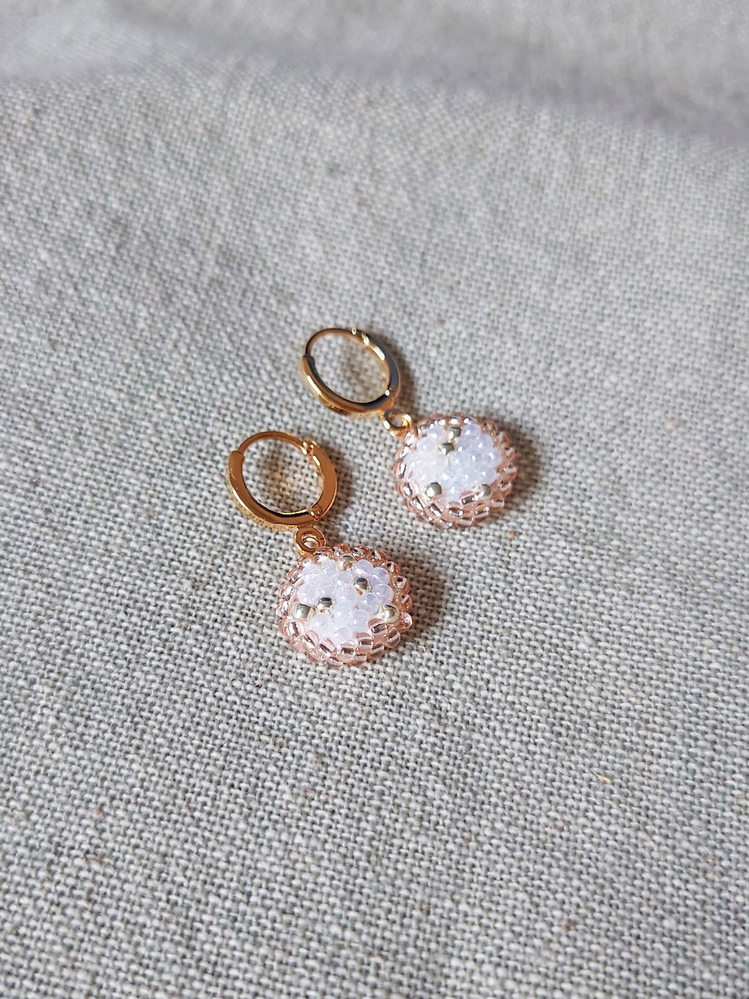 Rio Pendant Earrings in Champagne Pink Front