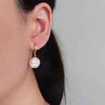 Rio Pendant Earrings in Champagne Pink Model
