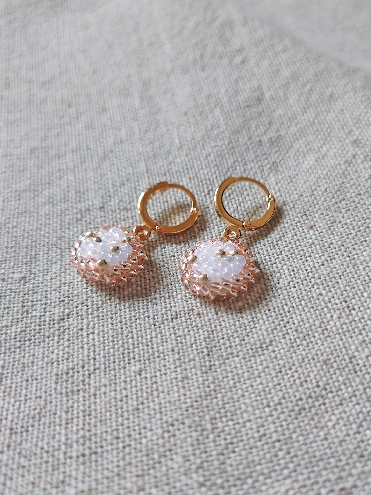 Rio Pendant Earrings in Champagne Pink Side