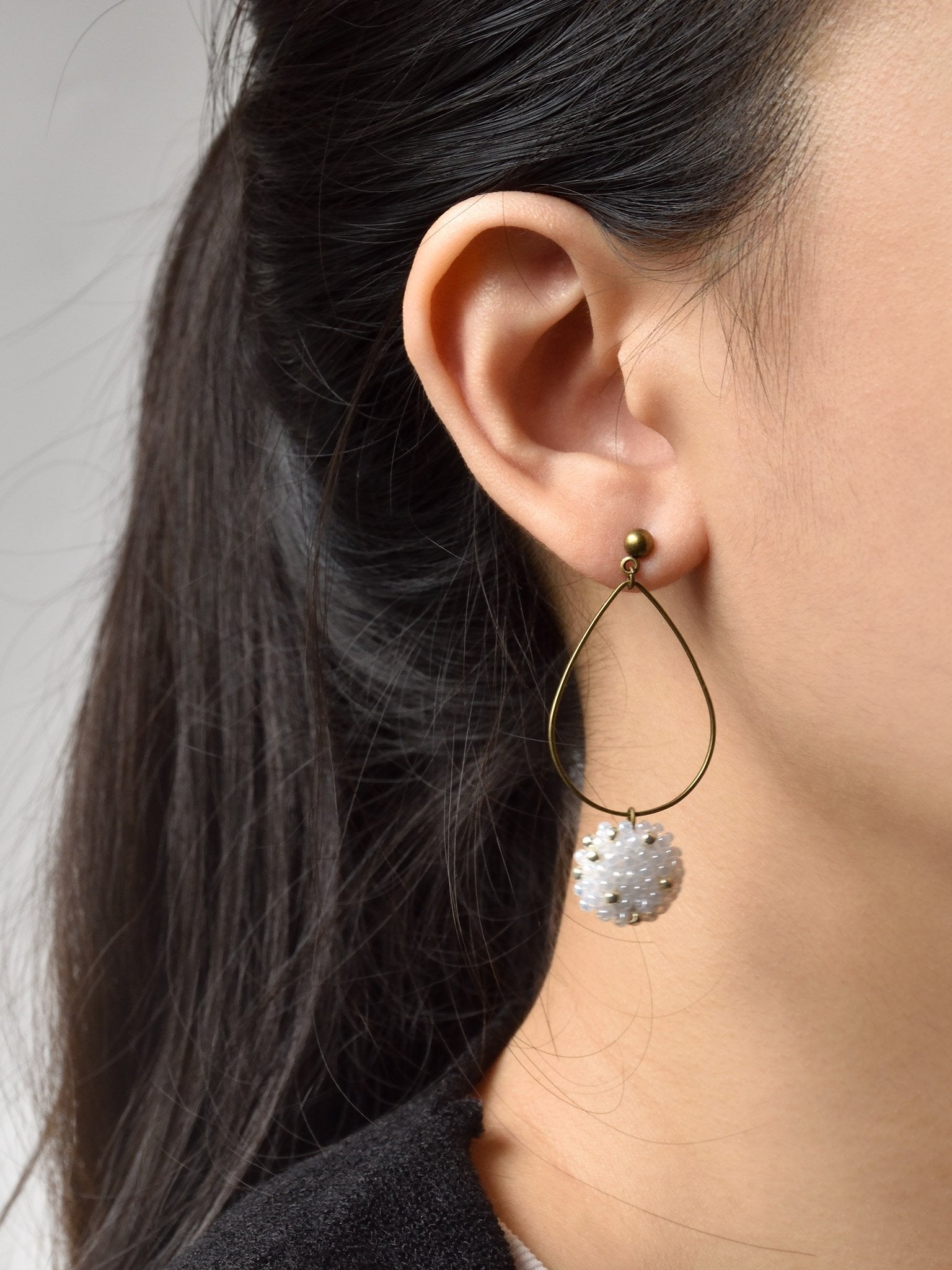 Tiana Teardrop Dangle Hoop Earrings Model