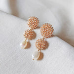Soleil Dangle Earrings in Champagne Pink Side
