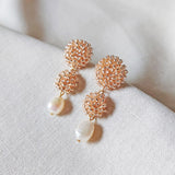 Soleil Dangle Earrings in Champagne Pink Side