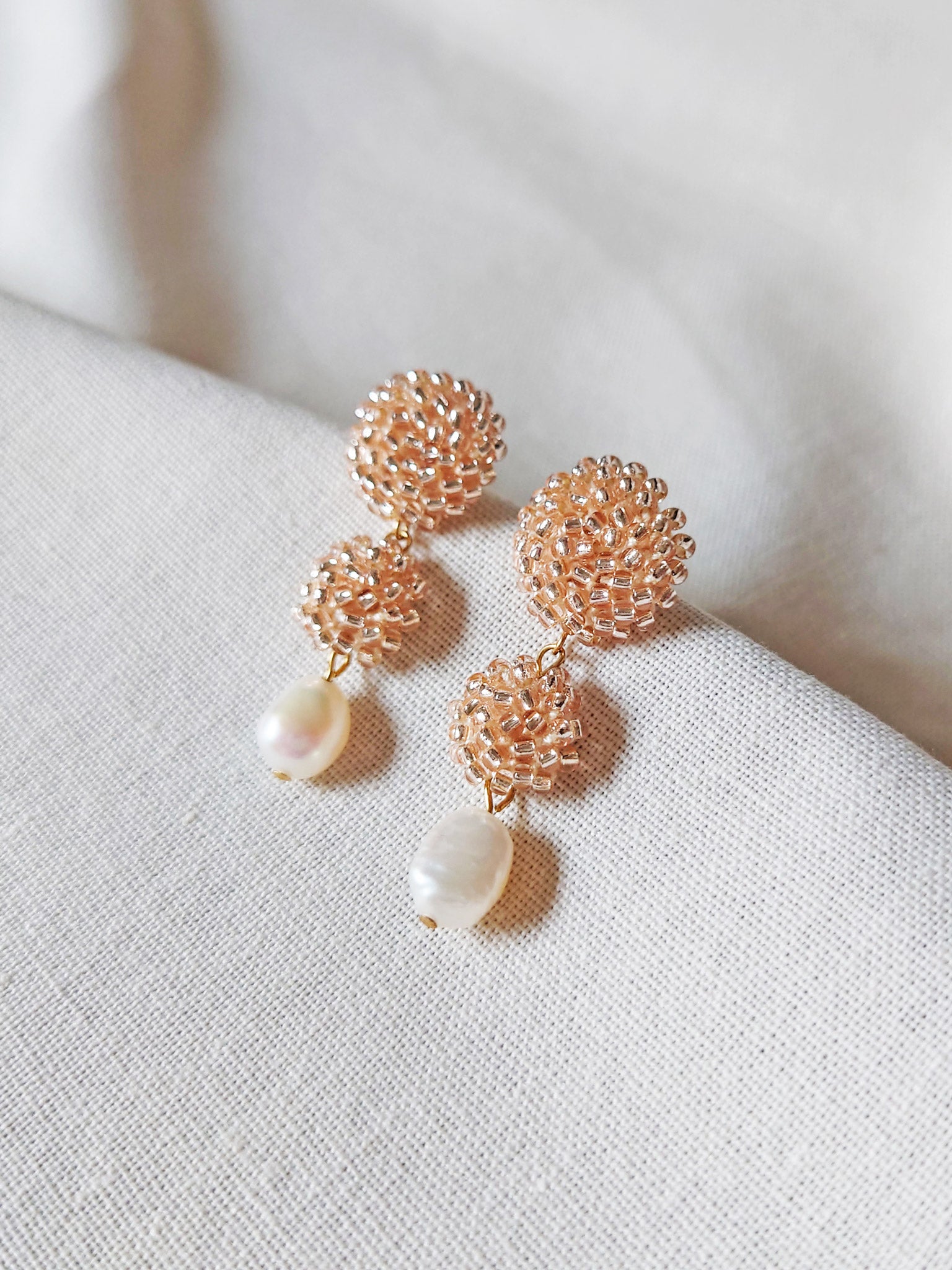 Soleil Dangle Earrings in Champagne Pink Side