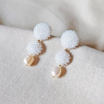 Soleil Dangle Earrings in White Front