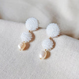 Soleil Dangle Earrings in White Front