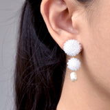 Soleil Dangle Earrings in White Model