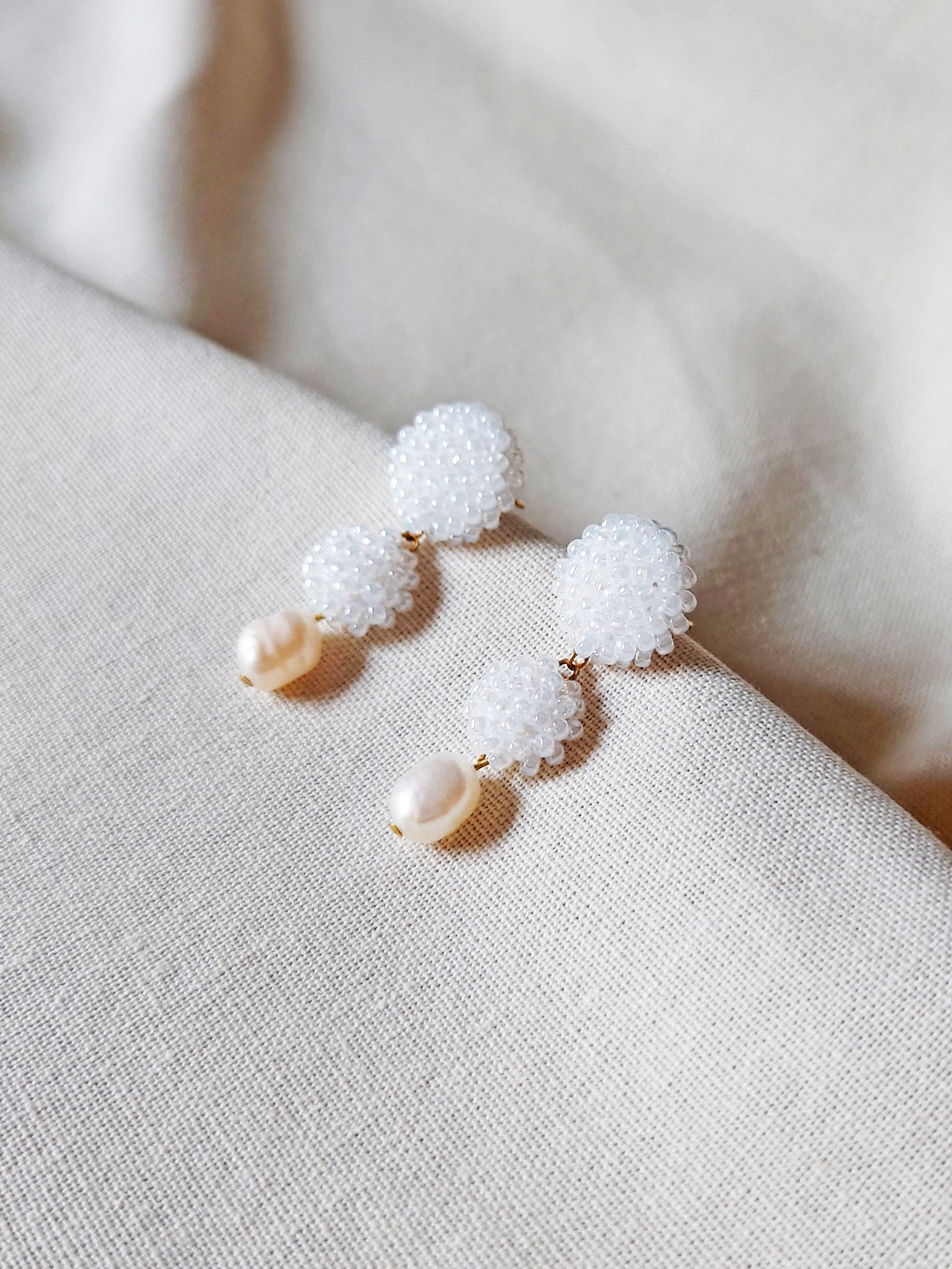 Soleil Dangle Earrings in White Side